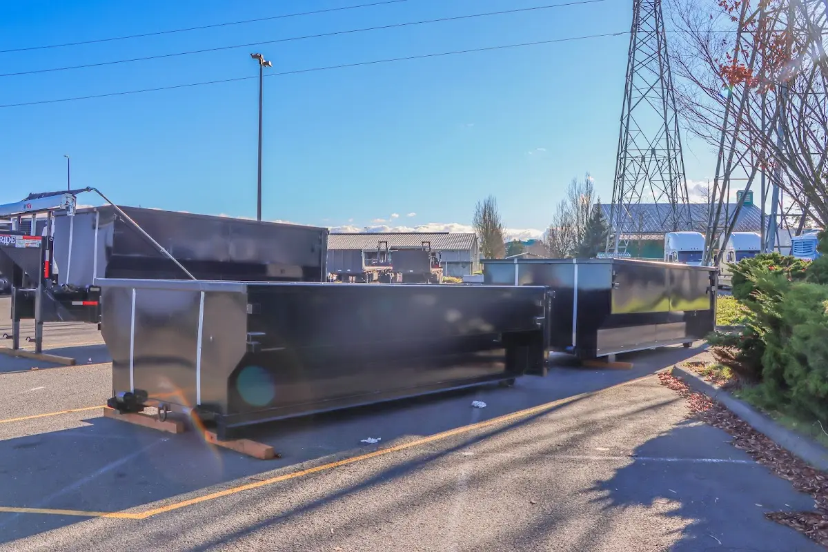 Roll-off dumpster ready for waste disposal at job site for Concrete Dumpster Rental in Delhi Hills